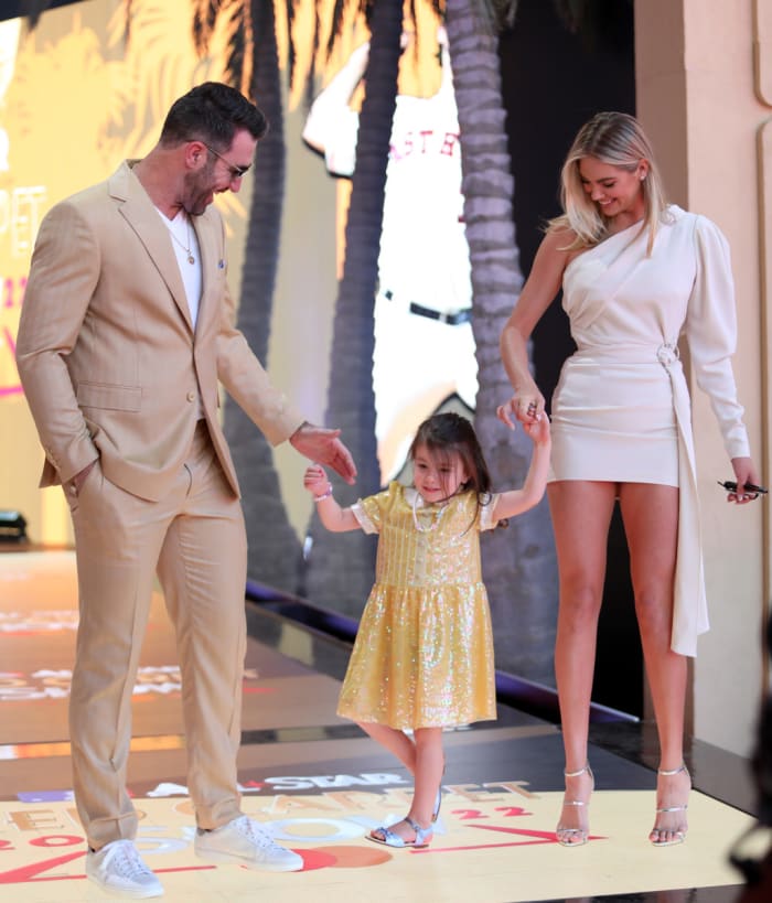 Kate Upton, Justin Verlander, and their daughter arrive at The 2022 MLB All-Star Game Red Carpet Show at XBOX Plaza on July 19, 2022 in Los Angeles, California.